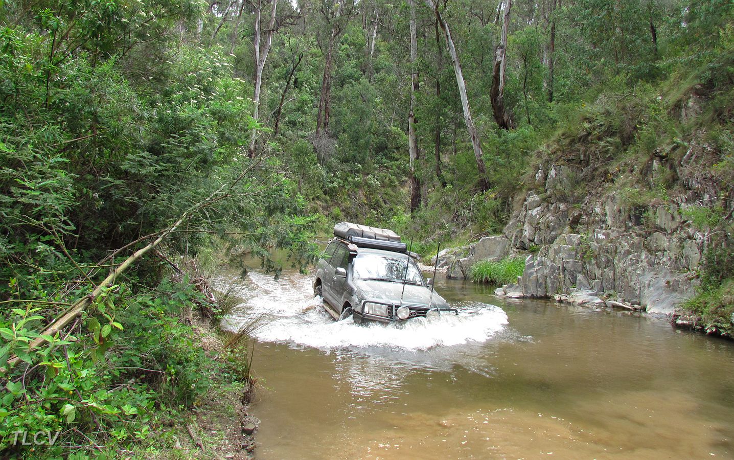 27-Michael enjoys driving down the Aberfeldy River.JPG